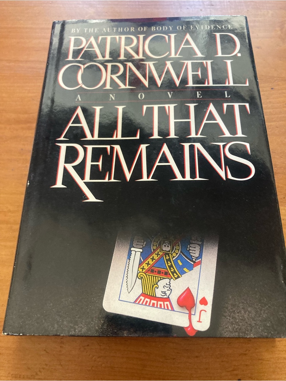 All That Remains Hard Cover Book - White and Red Cover Text
